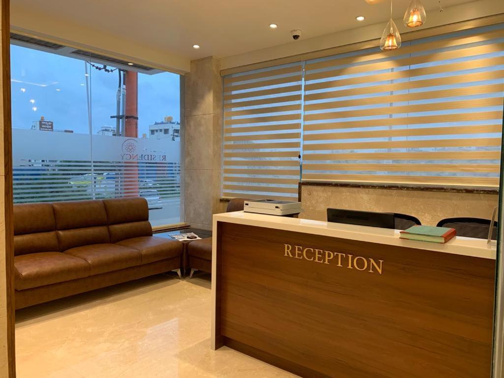 Jesta Residency Hotel Hassan Bagian luar foto