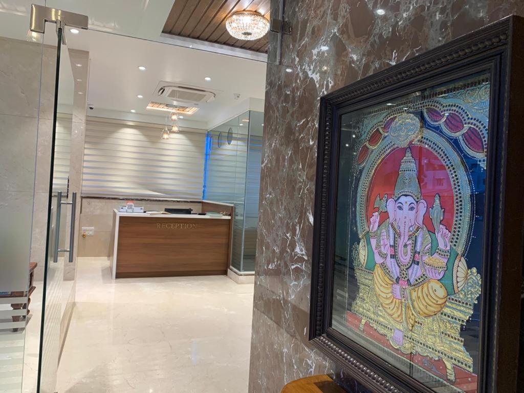 Jesta Residency Hotel Hassan Bagian luar foto