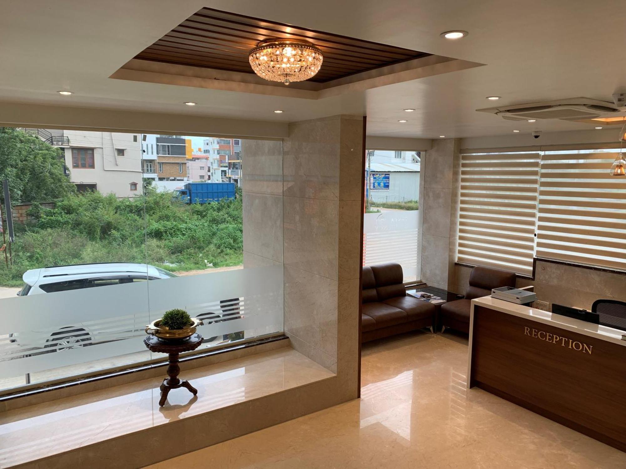 Jesta Residency Hotel Hassan Bagian luar foto